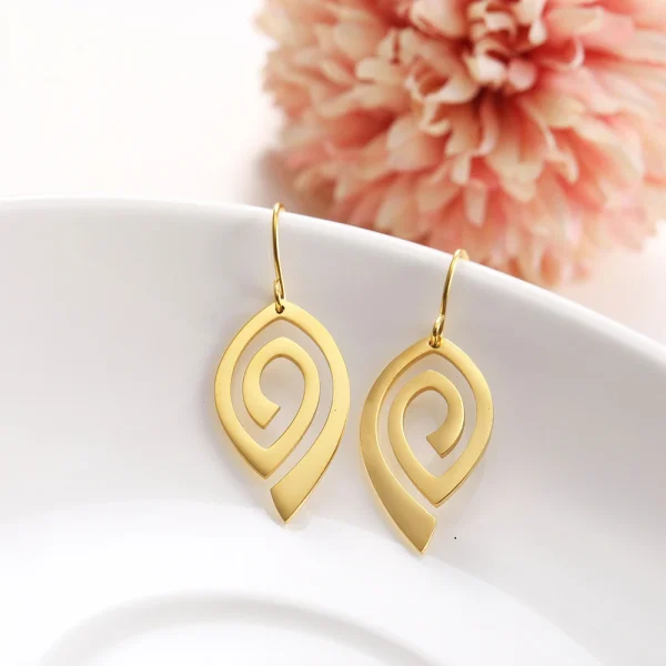 Boucles d'oreilles pendantes en spirale en acier… – Lueur… – Image 5