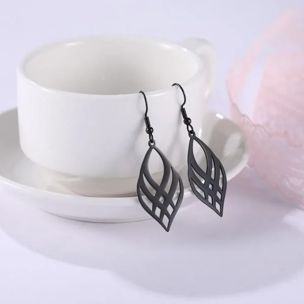 acier inoxydable géométrie symétrique boucles d'oreilles… –… – Image 8