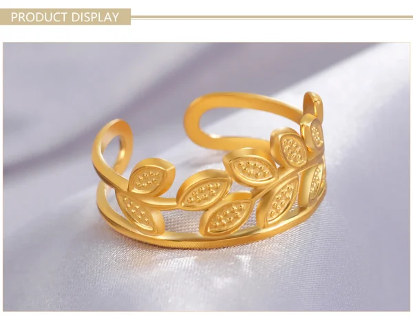 bague ouverte en forme de branche d'olivier en acier… – Chant… – Image 15