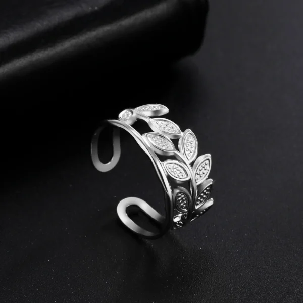 bague ouverte en forme de branche d'olivier en acier… – Chant… – Image 20
