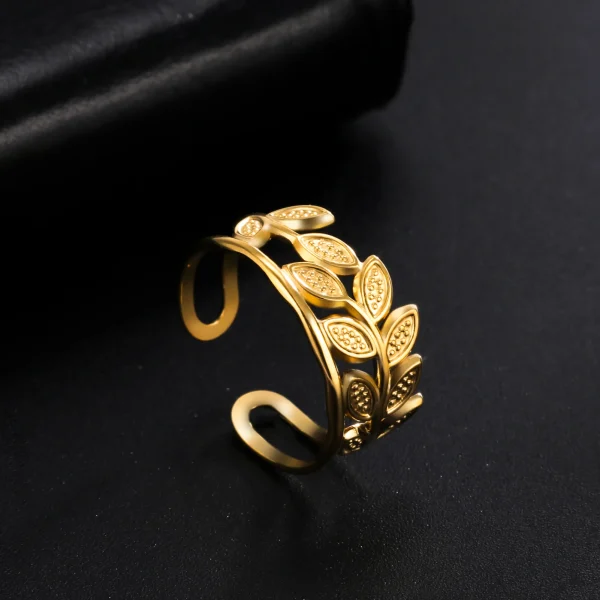 bague ouverte en forme de branche d'olivier en acier… – Chant… – Image 21