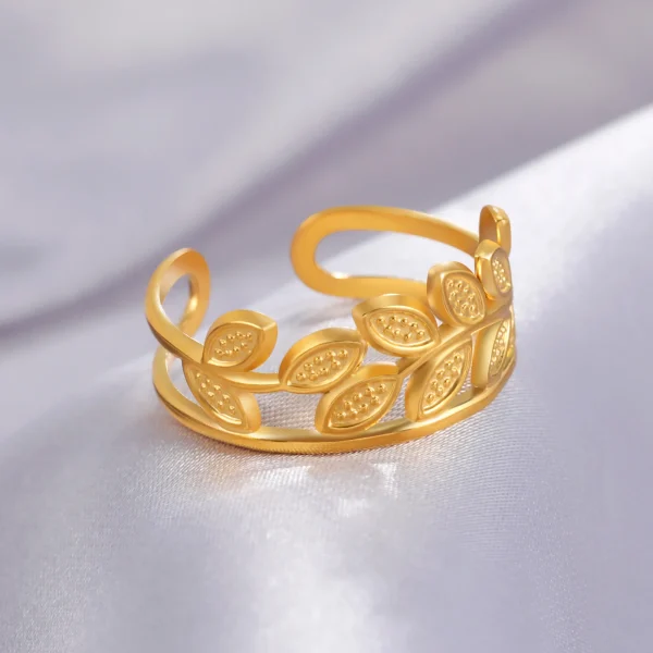 bague ouverte en forme de branche d'olivier en acier… – Chant… – Image 4