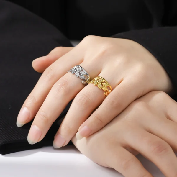 bague ouverte en forme de branche d'olivier en acier… – Chant… – Image 2